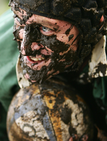 Muddy face of rugby player