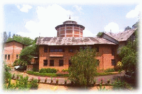 Laurie Baker's brick campus building with tower
