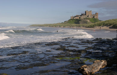 Bamburgh Castle on England's East Coast stands above the sea. It was built by the Normans.