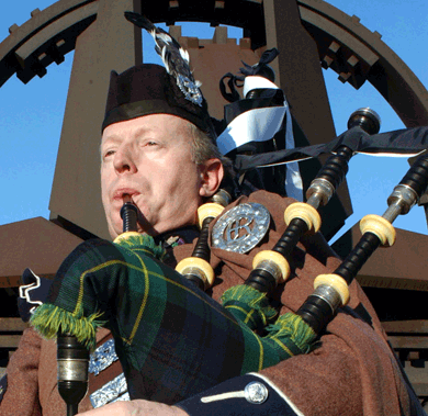 Scottish piper in full regalia