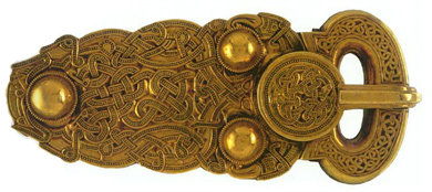 Intricate gold belt buckle