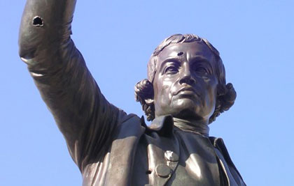 Statue of Burke with bullet holes