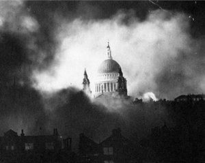 The dome of St Paul rises above the fiery smoke of London during bombing by the Nazis